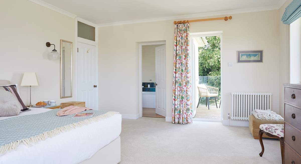 The final bedroom has a balcony overlooking the garden.