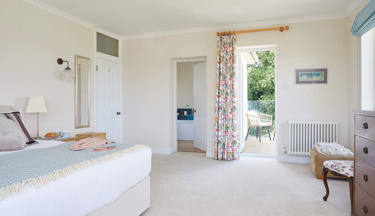 The final bedroom has a balcony overlooking the garden.