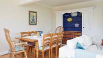The dining-area sits within the sociable open plan living-room.