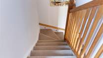 Stairs lead to the bedroom and shower-room.