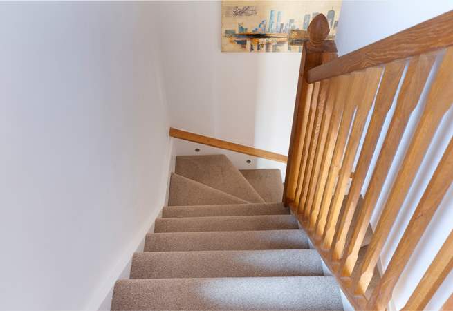 Stairs lead to the bedroom and shower-room.