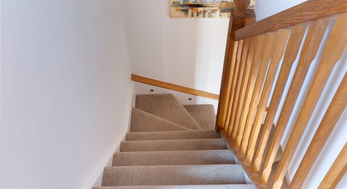 Stairs lead to the bedroom and shower-room.