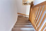 Stairs lead to the bedroom and shower-room.