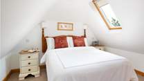 The Velux windows make the bedroom light and bright.