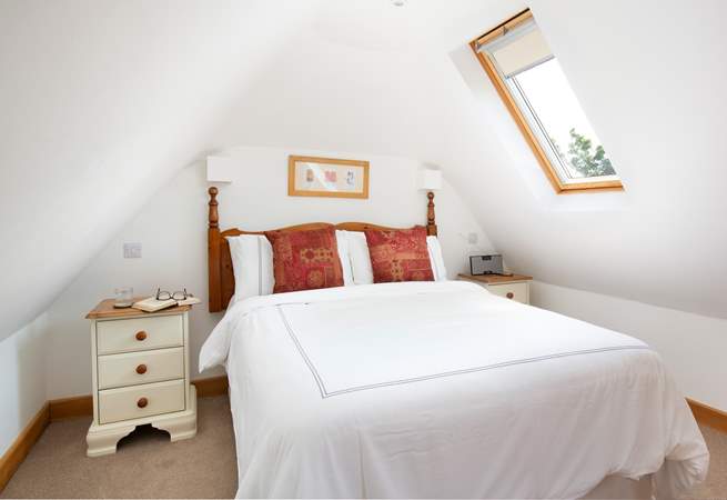 The Velux windows make the bedroom light and bright.