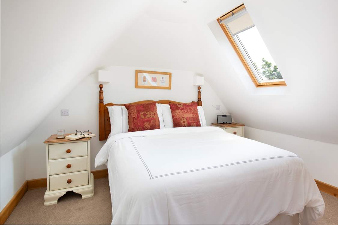 The Velux windows make the bedroom light and bright.