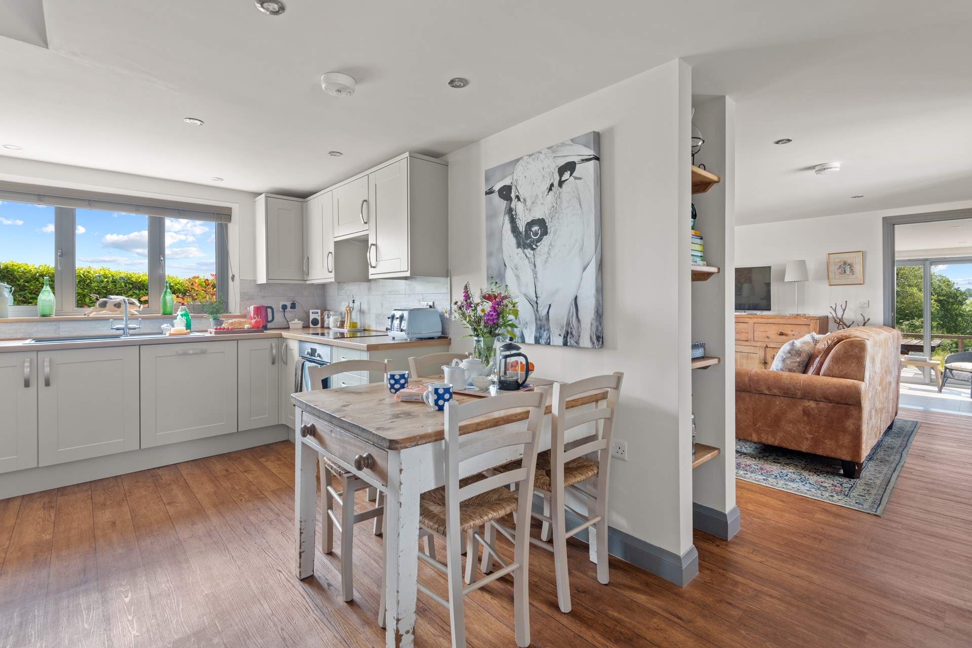 The dining area perches neatly on the outskirts of the kitchen. A lovely light and airy spot to enjoy any meal.