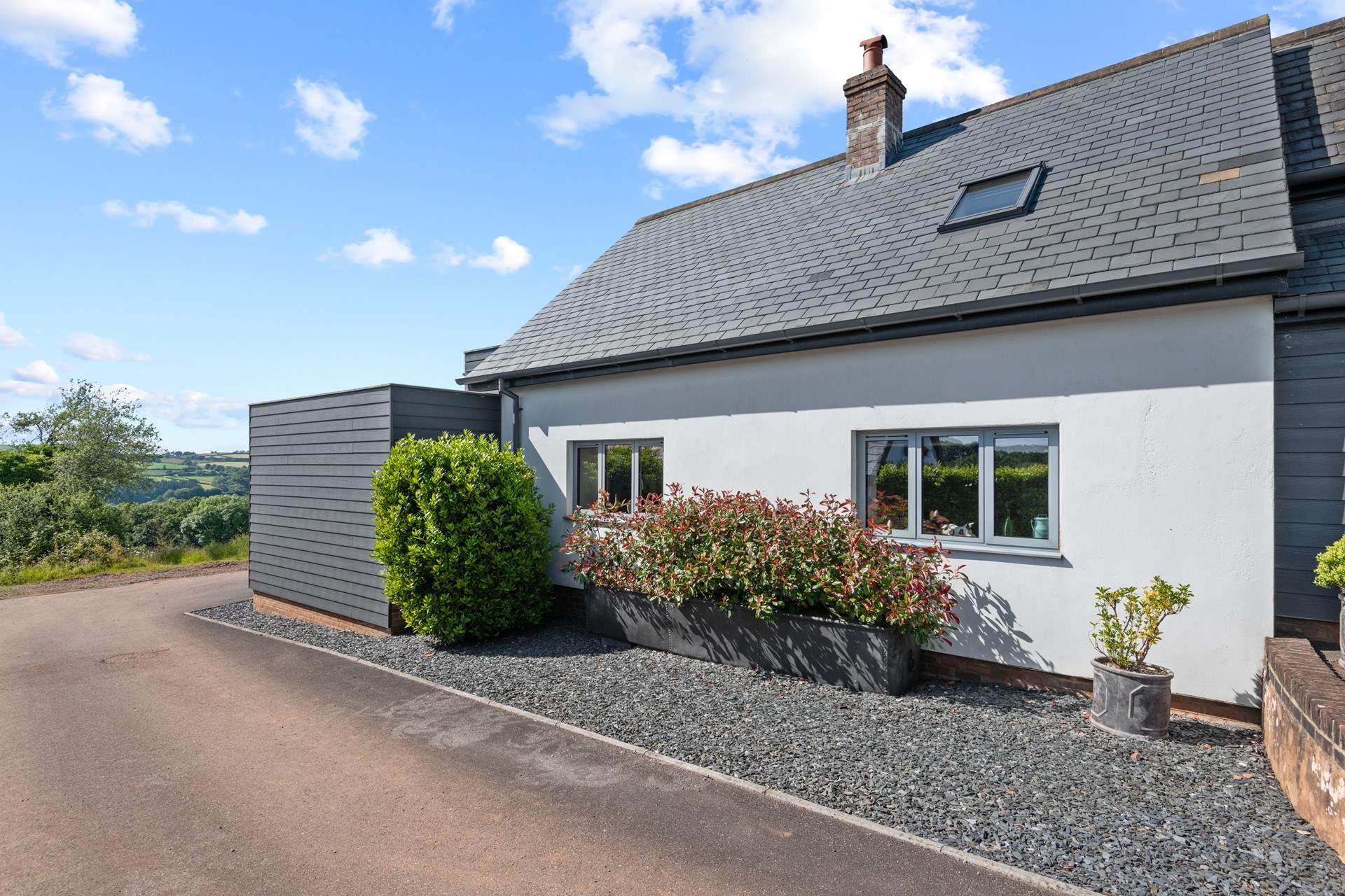 As you enter the grounds, this is the first sight you will have of the cottage. Please follow the path round to the right to your parking area.