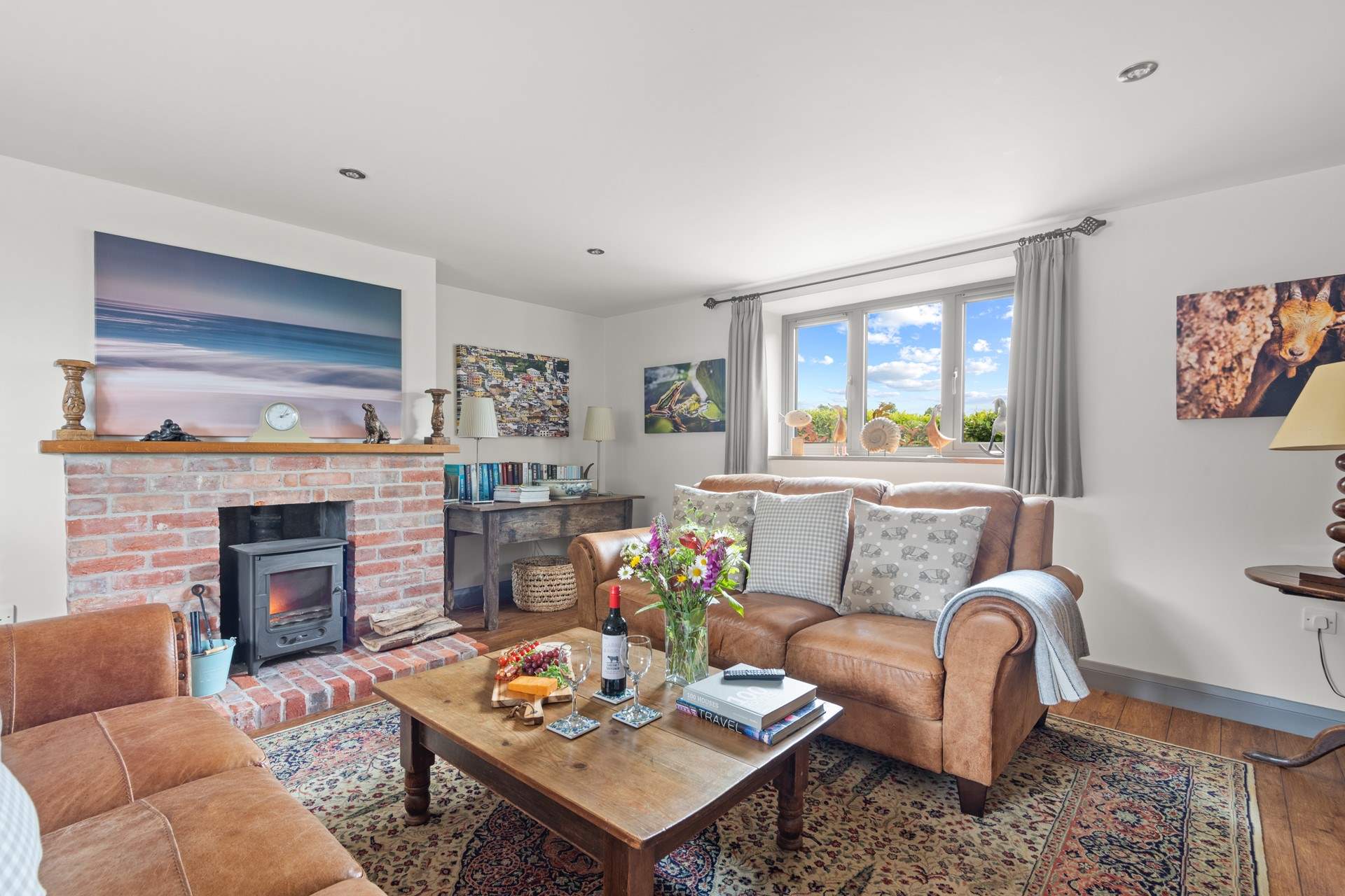 The sitting-room is super comfy, complemented by a toasty wood-burner.