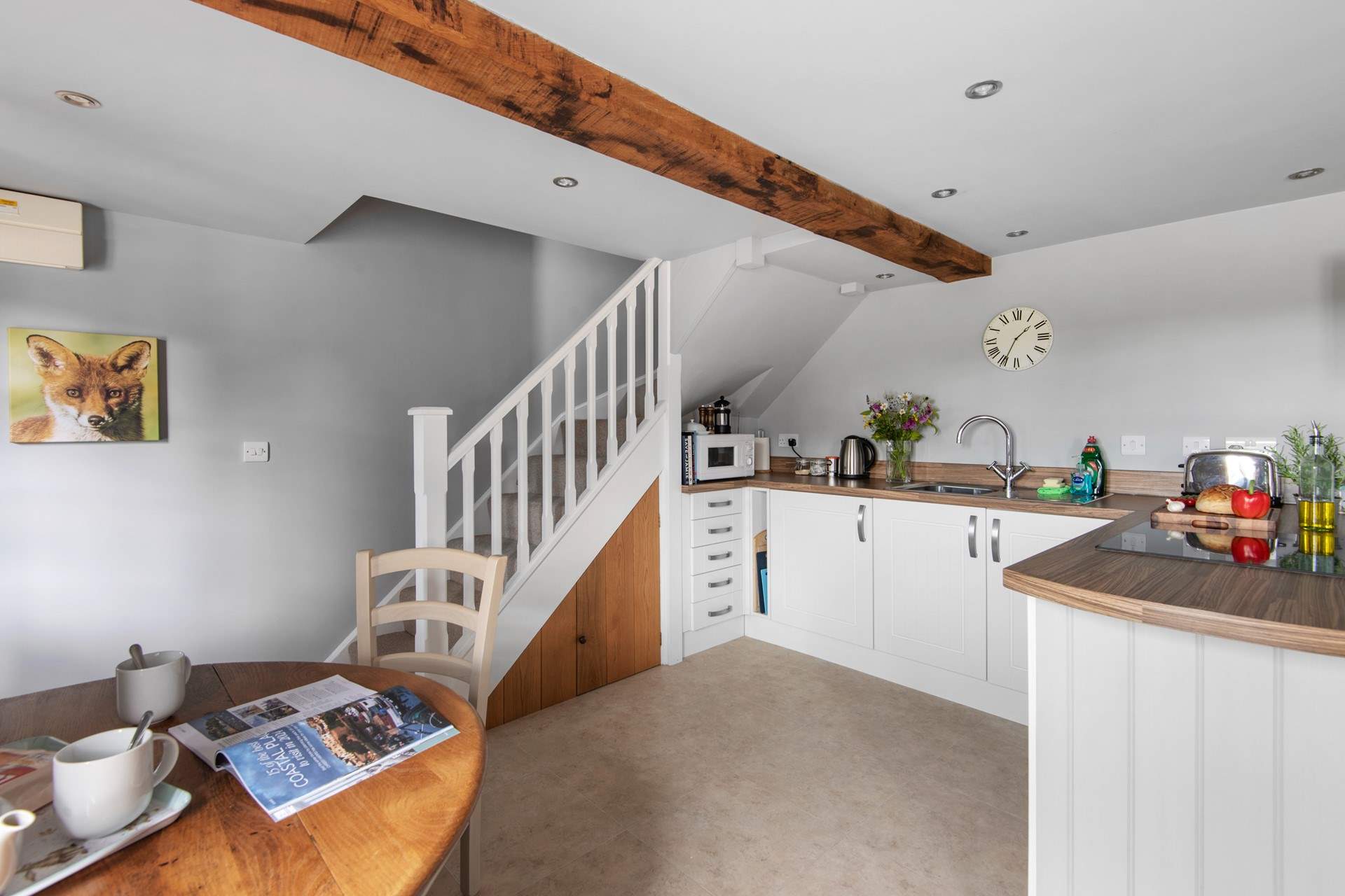 Head up the stairs to the first floor bedroom and shower-room.