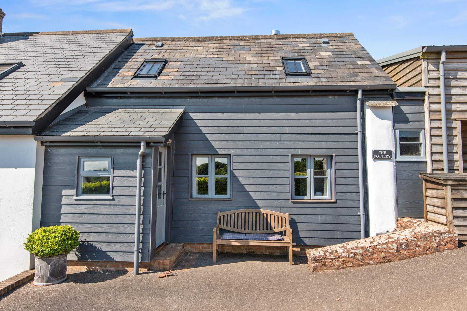 Enjoying your morning coffee on this purposefully placed bench makes for a super start to the day.