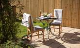 The patio is just made for evening drinks and nibbles. - Thumbnail Image