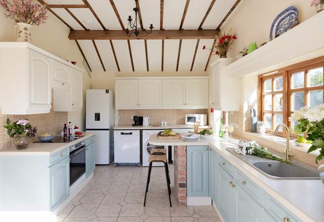 A spacious airy kitchen awaits.