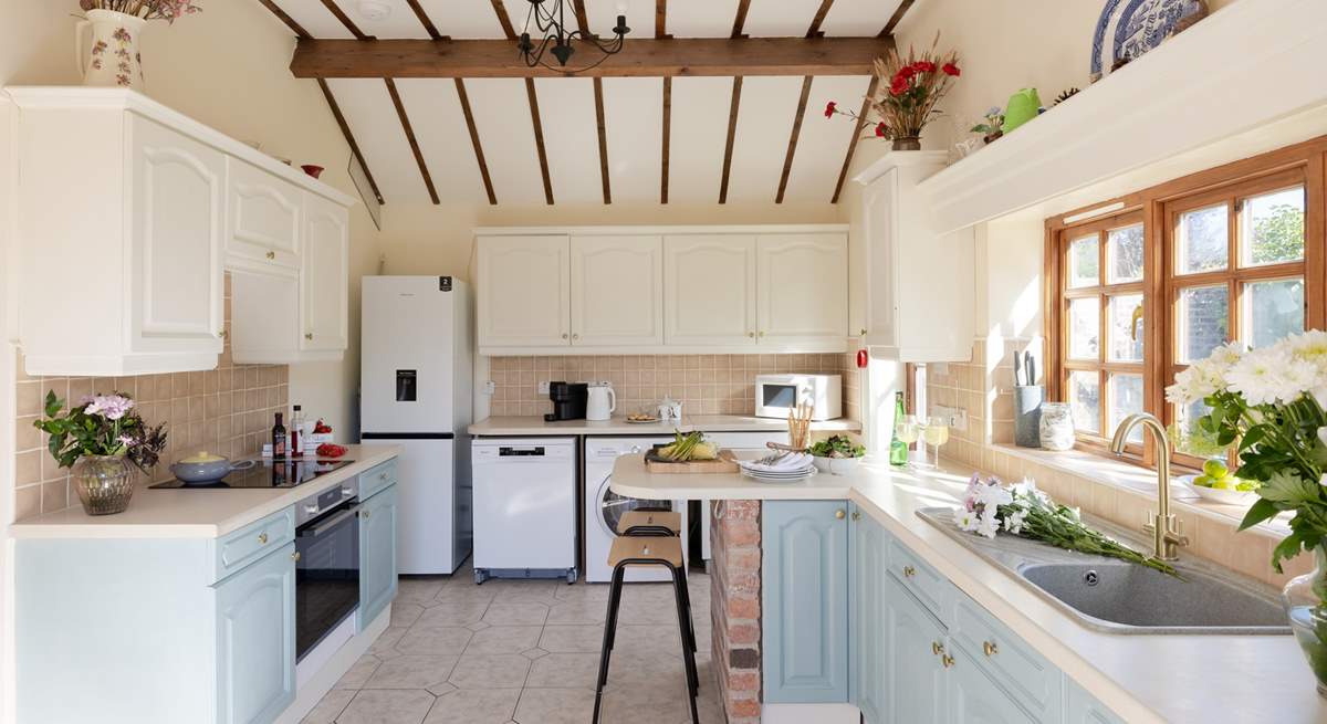 A spacious airy kitchen awaits.