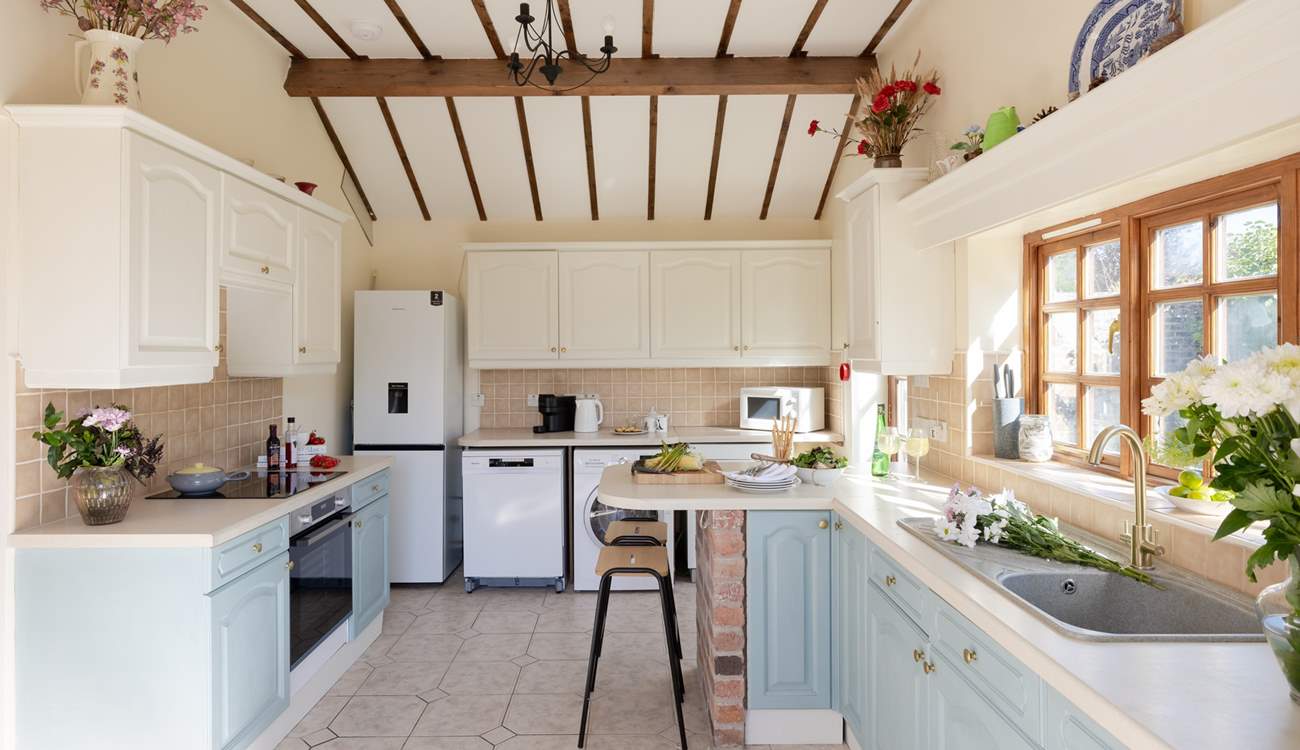 A spacious airy kitchen awaits.