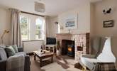 Cosy up in the sitting-room in front of the wood-burner. - Thumbnail Image