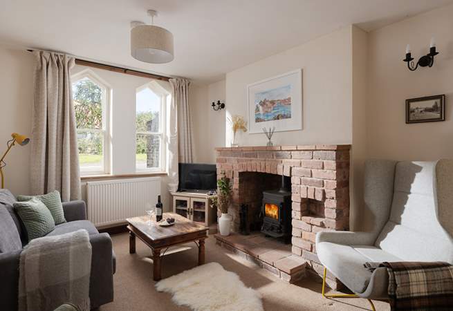 Cosy up in the sitting-room in front of the wood-burner.