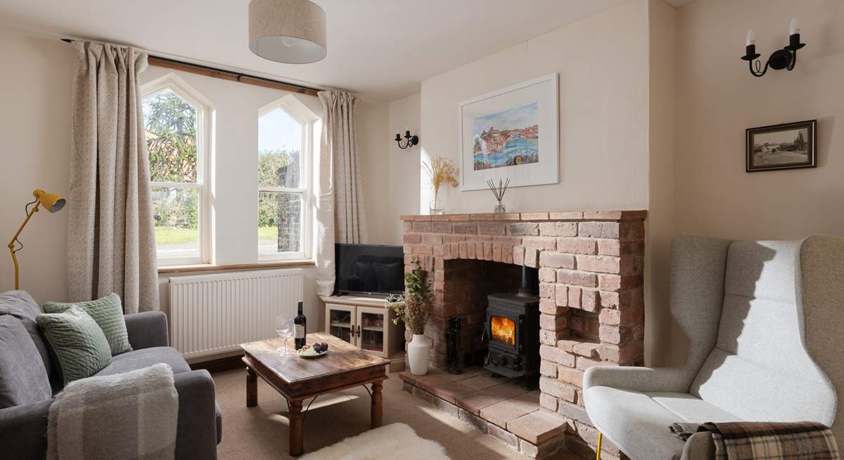 Cosy up in the sitting-room in front of the wood-burner.