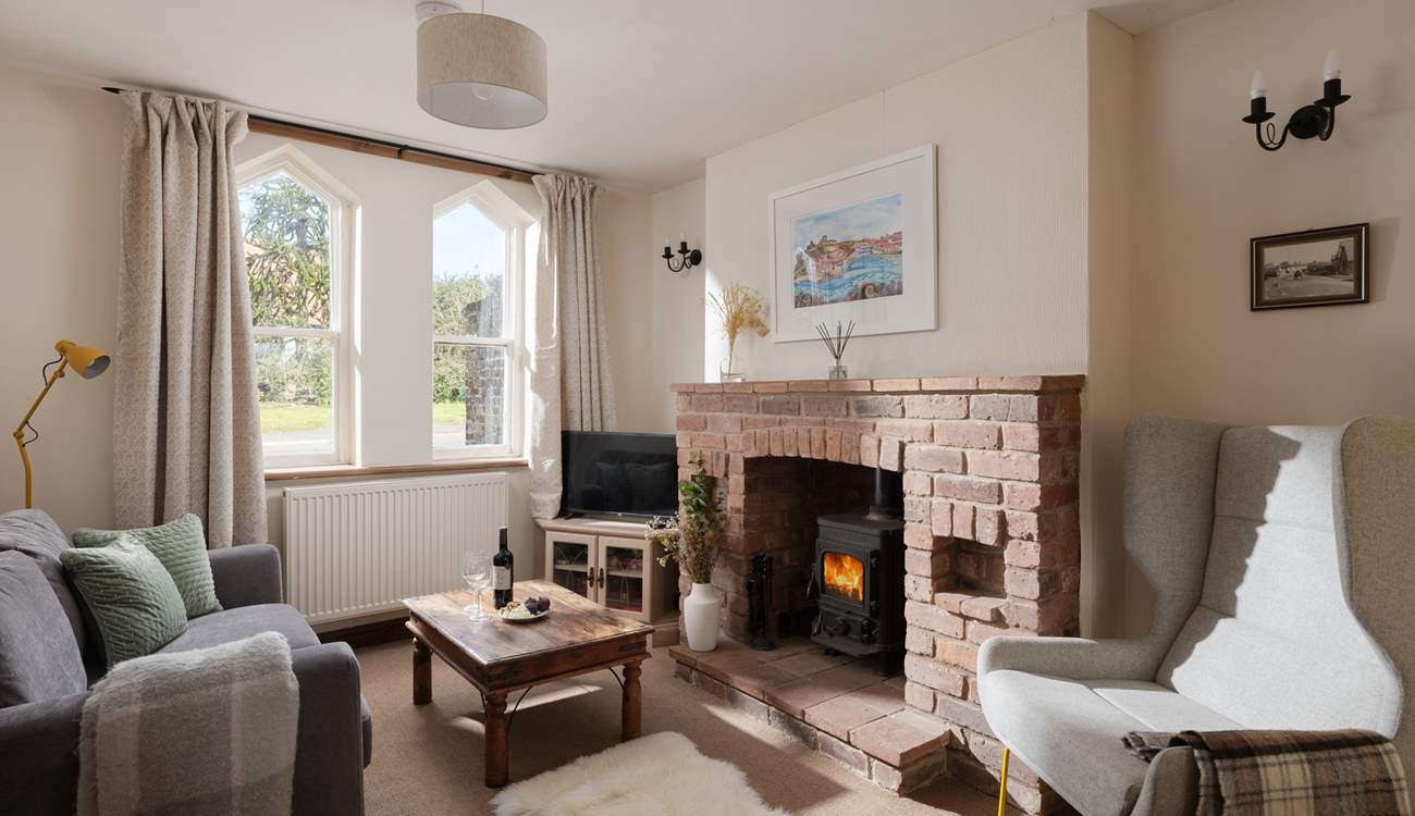 Cosy up in the sitting-room in front of the wood-burner.