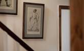 The walls up the stairs are lined with fantastic pictures. - Thumbnail Image