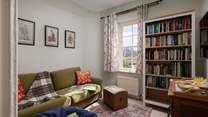 Relax in this cosy snug, read a book or watch the TV.