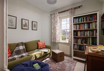 Relax in this cosy snug, read a book or watch the TV.