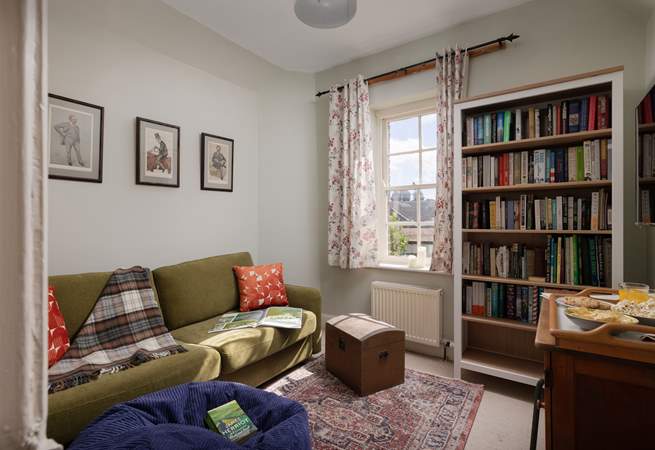 Relax in this cosy snug, read a book or watch the TV.