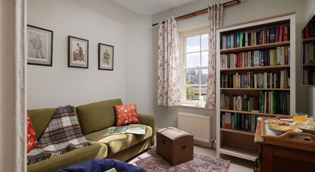 Relax in this cosy snug, read a book or watch the TV.