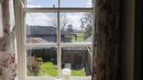 The view into the garden and over to the farmland beyond.