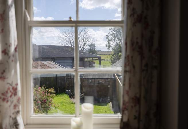 The view into the garden and over to the farmland beyond.