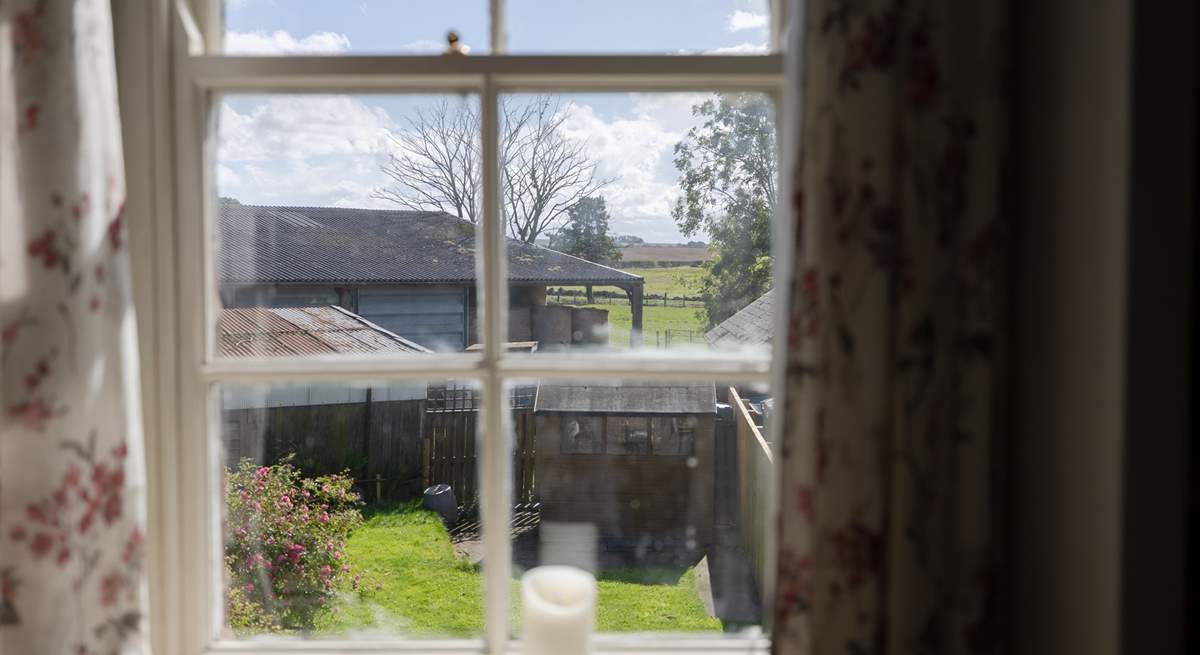 The view into the garden and over to the farmland beyond.