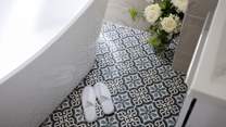 This luxury bathroom is a great place to unwind after a long day sightseeing.