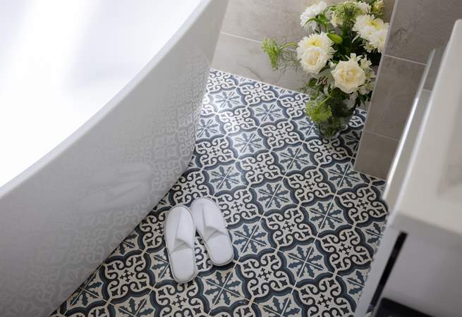 This luxury bathroom is a great place to unwind after a long day sightseeing.