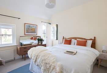 Another bright and airy bedroom with king-size double bed and more original windows.