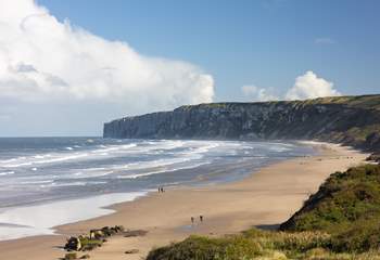 The cliffs toward Bempton where there is a RSPB site. Watch out for Puffins.