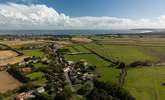 A view of the village of Muston over to the sea. - Thumbnail Image