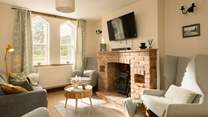 Cosy up in the sitting-room in front of the wood-burner.