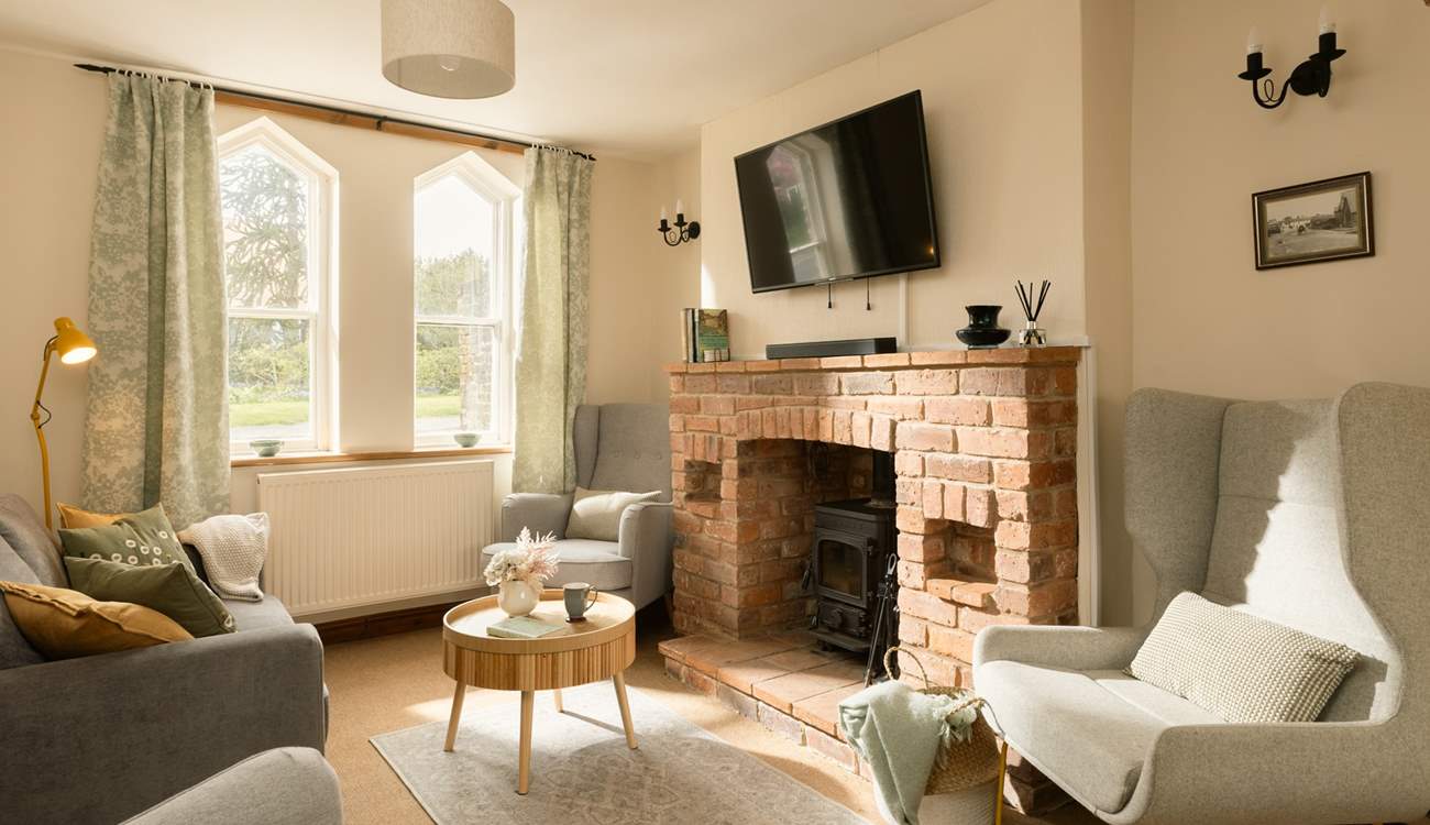Cosy up in the sitting-room in front of the wood-burner.