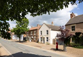 A quintessential north Yorkshire cobbled village street.