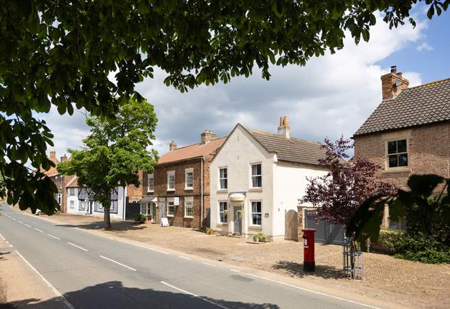 A quintessential north Yorkshire cobbled village street.