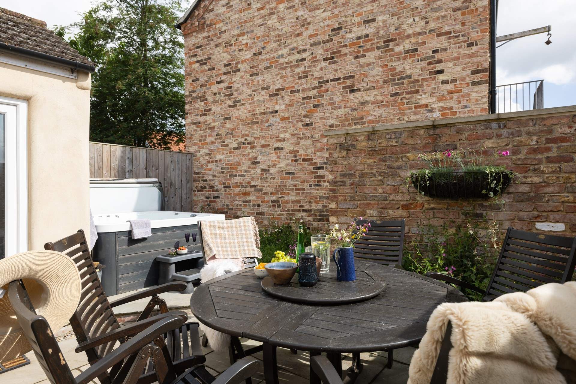 Step outside and into the soothing warmth of the hot tub. 