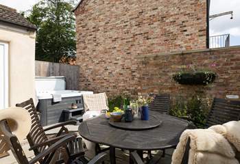 Step outside and into the soothing warmth of the hot tub. 