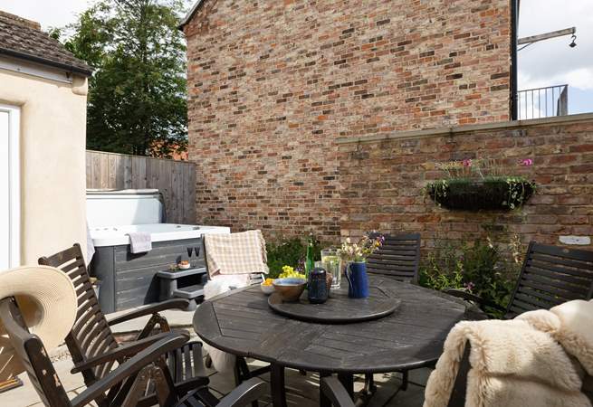 Step outside and into the soothing warmth of the hot tub. 