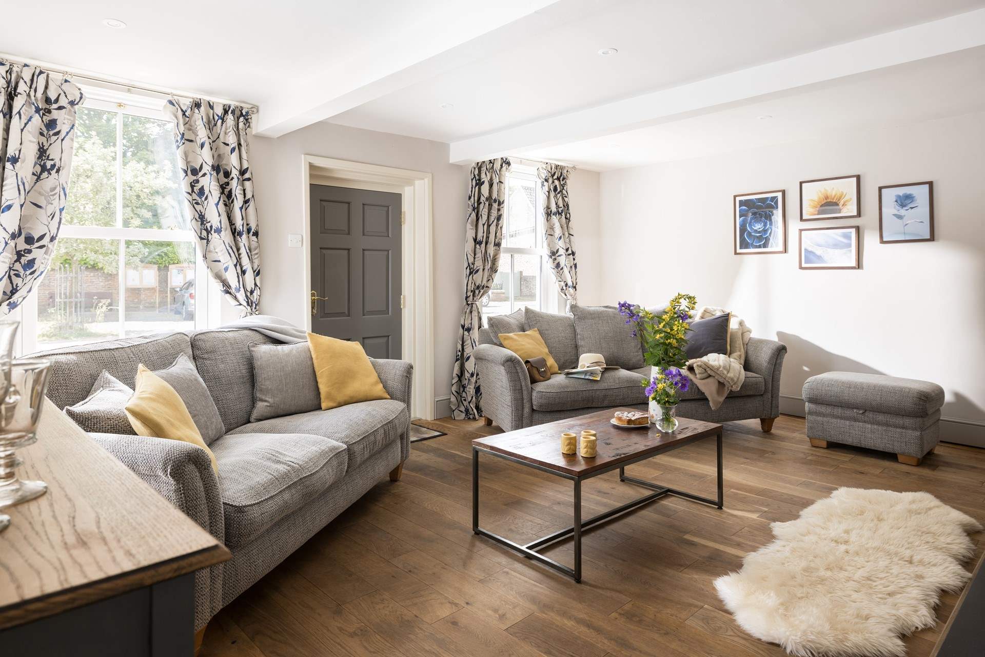 Large windows look out onto the cobbled village street.