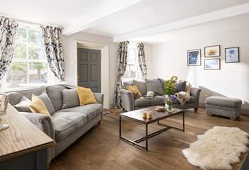 Large windows look out onto the cobbled village street.