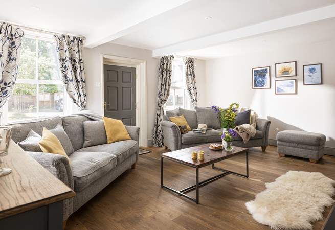 Large windows look out onto the cobbled village street.