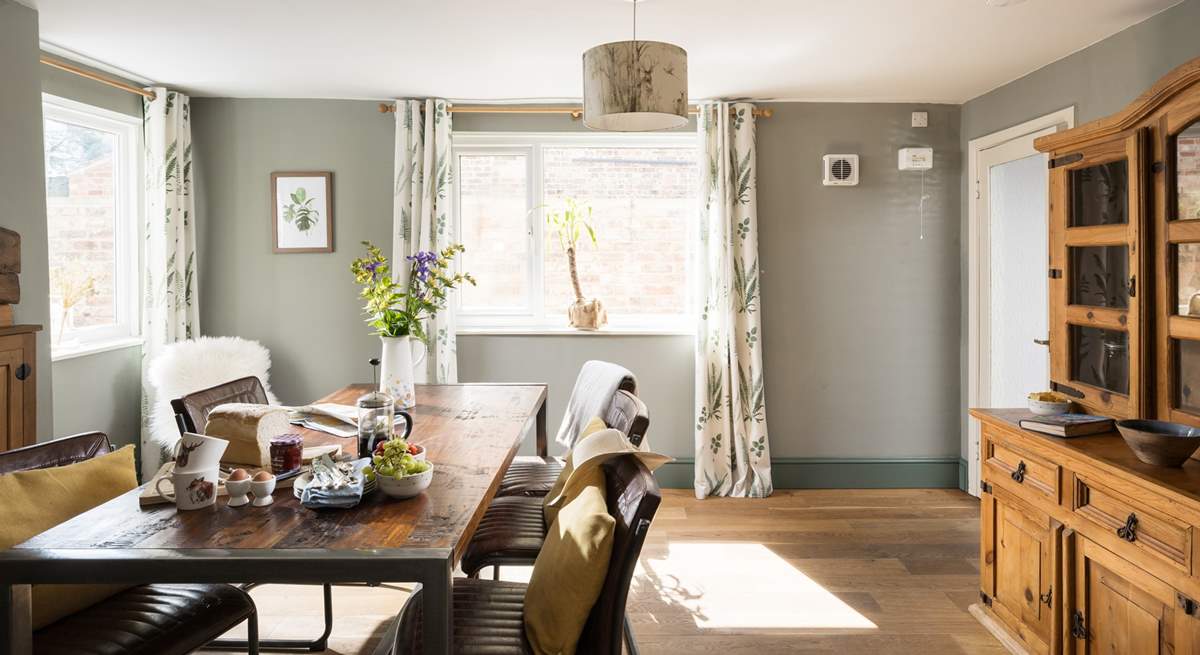 The dining-room has loads of space for everyone to gather and discuss the day's adventures.