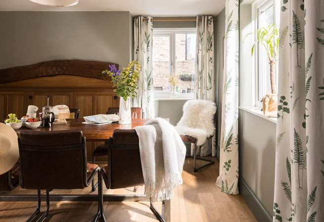 Original beams mix with the contemporary furniture beautifully. 