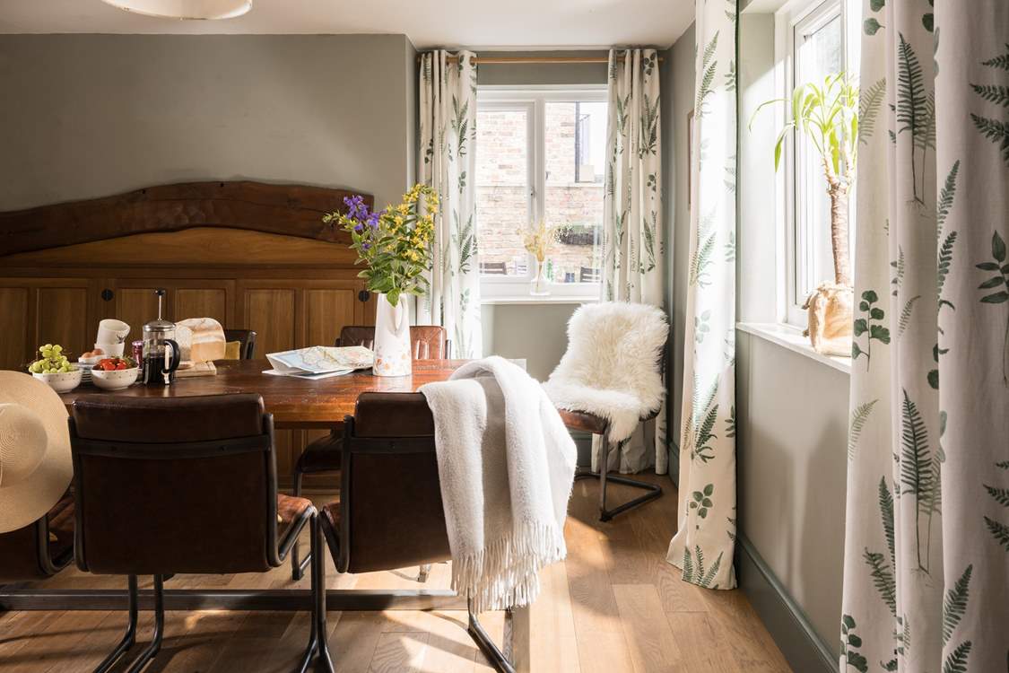 Original beams mix with the contemporary furniture beautifully.
