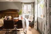 Original beams mix with the contemporary furniture beautifully.